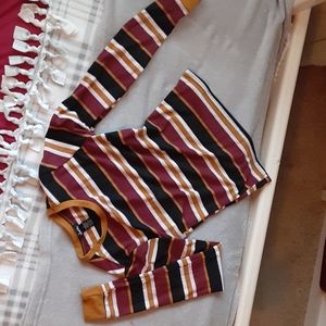 A tight striped long sleeve shirt